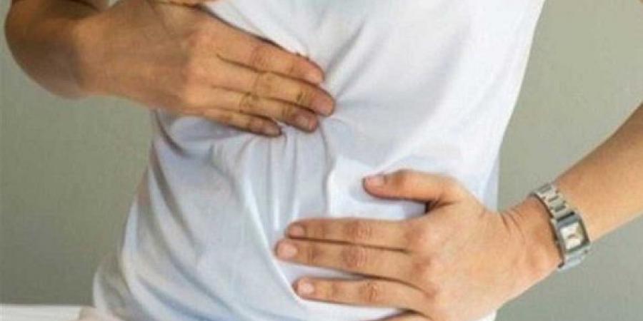 جراح يحذر لا تستهين بألم البطن العلوي بعد الطعام الدهني - هرم مصر