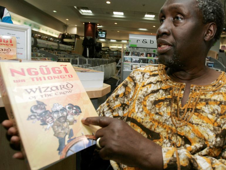 FILE PHOTO: Kenyan author Ngugi Wa Thiong'o shows his newly launched book