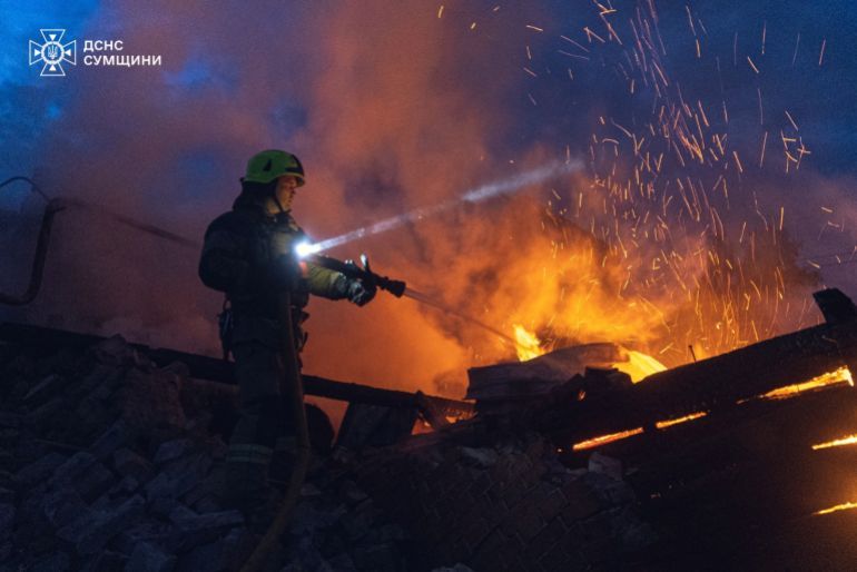 A firefighter works at a site of a Russian drone strike, amid Russia's attack on Ukraine, in Sumy region, Ukraine in this handout picture released May 29, 2025. Press service of the State Emergency Service of Ukraine in Sumy region/Handout via REUTERS ATTENTION EDITORS - THIS IMAGE HAS BEEN SUPPLIED BY A THIRD PARTY. DO NOT OBSCURE LOGO.