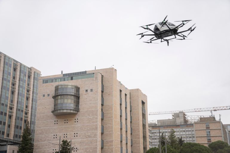 An automated drone taxi hovers in the air during an unveiling of the driverless technology outside Hadassah Medical Center in Jerusalem, Wednesday, Sept 13, 2023. (AP Photo/Ohad Zwigenberg)