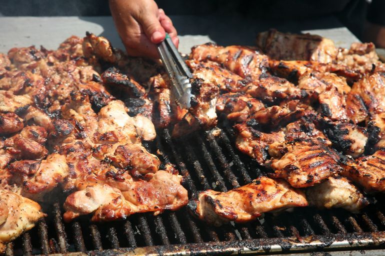 Grilled Chicken. Barbecued Chicken. BBQ Chicken. Lunch. Dinner. Snack. Food. Fair Food. Outdoor Event. Cooked Chicken Breast. Grilled meat. Appetizing grilled Foul. Grill roast bbq Bird. Outdoor.
