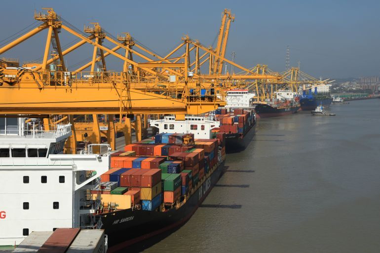 ارشيف CHITTAGONG, BANGLADESH - 2021/11/17: Aerial view of containers and shipyard cranes at Chittagong Port. Chittagong Port on the banks of the Karnaphuli river is Bangladesh's main seaport. (Photo by Md Manik/SOPA Images/LightRocket via Getty Images)