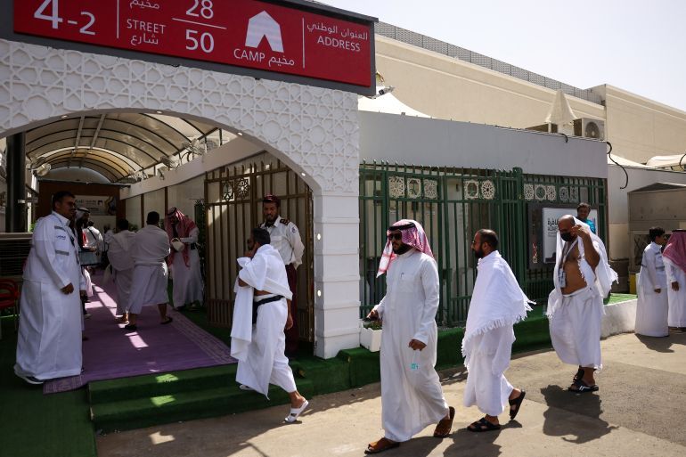 Muslim worshippers arrive at a camp housing pilgrims in Mina near Islam's holy city of Mecca on June 3, 2025, ahead of the annual Hajj pilgrimage.