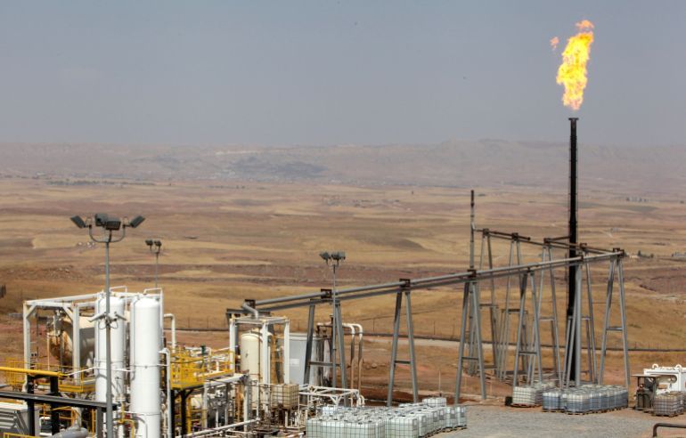A flame rises from a chimney at Taq Taq oil field in Arbil, in Iraq's Kurdistan region, August 16, 2014. Picture taken August 16, 2014. REUTERS/Azad Lashkari (IRAQ - Tags: ENERGY BUSINESS COMMODITIES)
