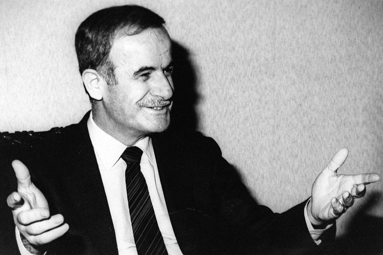 Syrian President Hafez al-Assad gestures in his office in Damascus in 1972. (Photo by SANA / AFP)