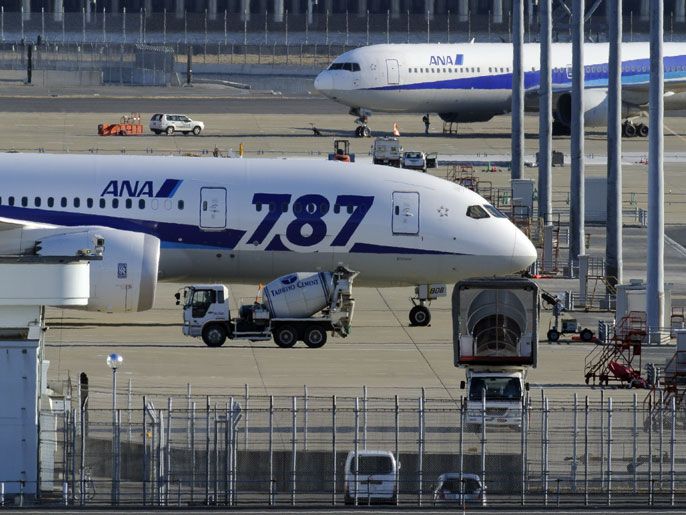 epa03542010 An ANA Boeing 787 Dreamliner is seen grounded at Haneda airport in Tokyo, Japan, 18 January 2013. Since the Boeing 787 Dreamliners are grounded due to safety concerns, All Nippon Airways Co. (ANA) and Japan Airlines Co. (JAL) had to cancel several domestic and international flights. Media reports say that ANA is particularly hit as it owns 17 Dreamliners and was forced to cancel 24 domestic flights and six international flights on 18 January. EPA/FRANCK ROBICHON