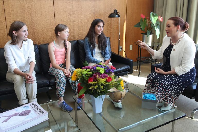 FILE - In this Aug. 30, 2019 phto, climate activists Xiye Bastida, third from left, Greta Thunberg, second from left, and Alexandria Villasenor, left, meet with U.N. General Assembly President María Fernanda Espinosa Garces, at United Nations headquarters. Bastida and Villasenor are both leaders in the New York City climate movement. Bastida, originally from Mexico, is a high school student in New York, and has met regularly with elected officials and those in the United Nations. She said that many in her generation are feeling what she calls “climate anxiety.” So she regularly trains others on climate issues and how to lobby politicians for change in environmental policy. “I saw that a lot of people cared, but they didn’t know how to start executing their newly found passion or stress,” she said. (AP Photo/Mary Altaffer)