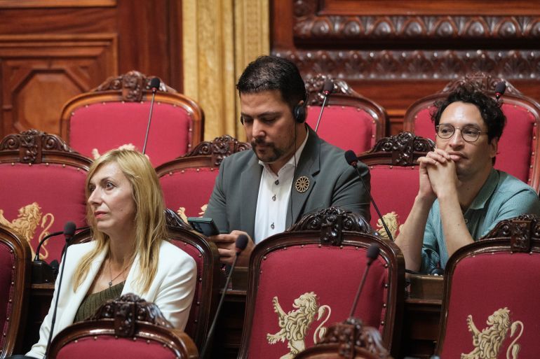 BRUSSELS, BELGIUM - JULY 18: Belgium senators, member from 'Groen' Celia Groothedde (Celia Ledoux) (L), from Ecolo Hajib El Hajjaji (C) and from 'Green' Fourat Ben Chikha (R) attend a senator oath of office in the Belgium Senate on July 18, 2024 in Brussels, Belgium. With the entry into force of the 6th state reform, most senators have, since May 25, 2014, 50 are appointed by Community or Regional parliaments, while the others 10 senators are co-opted. They participate in the federal decision-making process, while defending the interests of the federated entities. (Photo by Thierry Monasse/Getty Images)