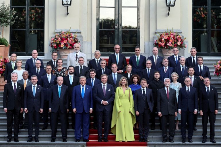 Turkey's President Tayyip Erdogan, U.S. President Donald Trump, Dutch King Willem-Alexander and Dutch Queen Maxima, France's President Emmanuel Macron, Italian Prime Minister Giorgia Meloni, Canadian Prime Minister Mark Carney, Ukraine's President Volodymyr Zelenskiy, Britain's Prime Minister Keir Starmer, Greek Prime Minister Kyriakos Mitsotakis, Danish Prime Minister Mette Frederiksen, Sweden's Prime Minister Ulf Kristersson, German Chancellor Friedrich Merz, Slovakia's President Peter Pellegrini, Spanish Prime Minister Pedro Sanchez, Poland's outgoing President Andrzej Duda, European Commission President Ursula von der Leyen and European Council President Antonio Costa, NATO Secretary General Mark Rutte and NATO heads of state and governments pose for a picture ahead of a dinner hosted by Dutch King Willem-Alexander and Dutch Queen Maxima, on the sidelines of a NATO Summit, at Huis ten Bosch Palace in The Hague, Netherlands June 24, 2025. REUTERS/Christian Hartmann/Pool