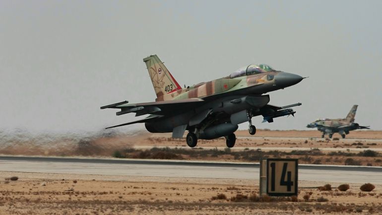 RAMON AIR FORCE BASE, ISRAEL - NOVEMBER 19: An Israeli Air Force F-16I jet fighter takes off as another lands behind it during a presentation to the media November 19, 2008 at the Ramon Air Force base in southern Israel. Israel displayed its most advanced air power which could be used to attack Iran's suspected nuclear weapons project if diplomacy fails to persuade Teheran to halt its uranium enrichment program. (Photo by David Silverman/Getty Images)