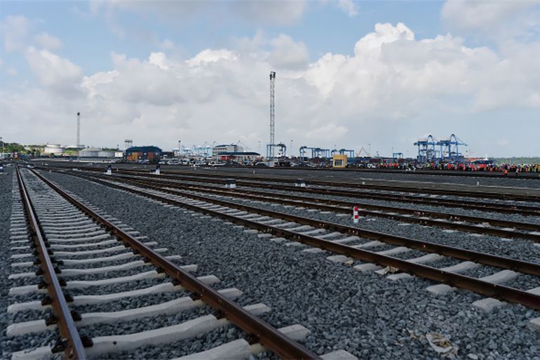 This photo taken on May 30, 2017 shows the train tracks of the container terminal of the port of Mombasa. More than a century after a colonial railway gave birth to modern Kenya, the country is betting on a new Chinese-built route to cement its position as the gateway to East Africa. The $3.2 billion (2.8 billion euro) railway linking Nairobi with the port city of Mombasa will May 31 take its first passengers on the 472 kilometre (293 mile) journey, allowing them to skip a hair-raising drive on one of Kenya's most dangerous highways. (Photo by TONY KARUMBA / AFP)