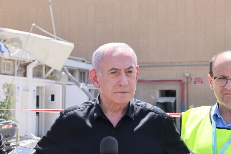 epa12185451 Israeli Prime Minister Benjamin Netanyahu speaks to the press as he visits the Soroka hospital complex, after it was hit by a missile fired from Iran, in Beer Sheva, Israel, 19 June 2025. Israel and Iran have been exchanging fire since Israel launched strikes across Iran on 13 June 2025 as part of Operation 'Rising Lion.' EPA-EFE/MARC ISRAEL SELLEM/POOL