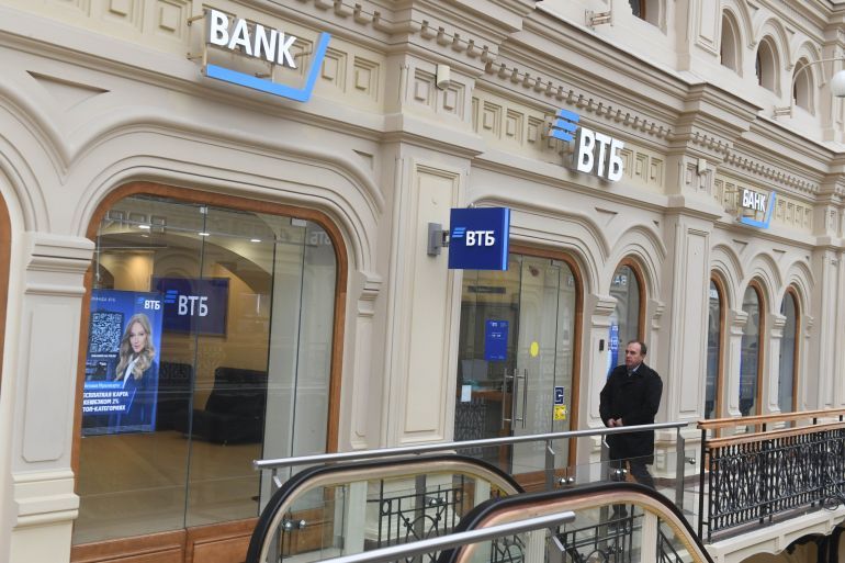 MOSCOW, RUSSIA - 2022/09/15: A man walks past VTB Bank at the Gum Building. (Photo by Daniel Felipe Kutepov/SOPA Images/LightRocket via Getty Images)