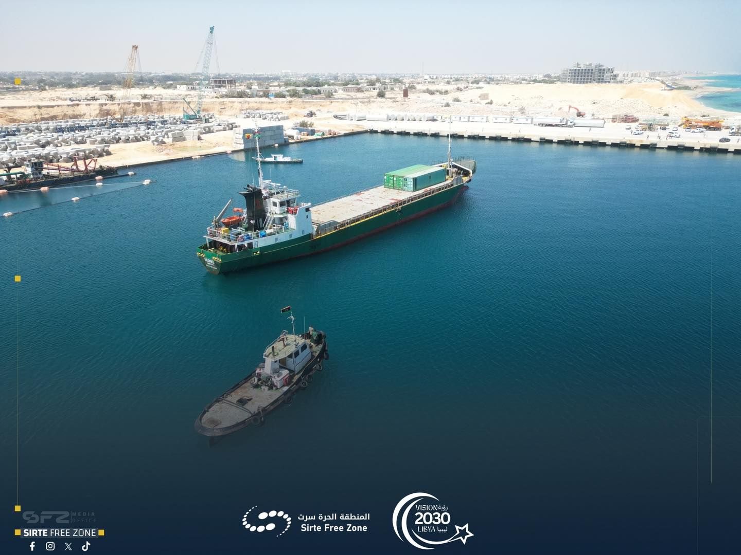 May be an image of ‎boat, oil refinery and ‎text that says '‎SIRTE FREE SIRTEFREEZONEN ZONE fox f سرت الحرة المنطفة Sirte Free Zone yEЮX4e 2030 さい ليمباناغر لسم لمهما‎'‎‎
