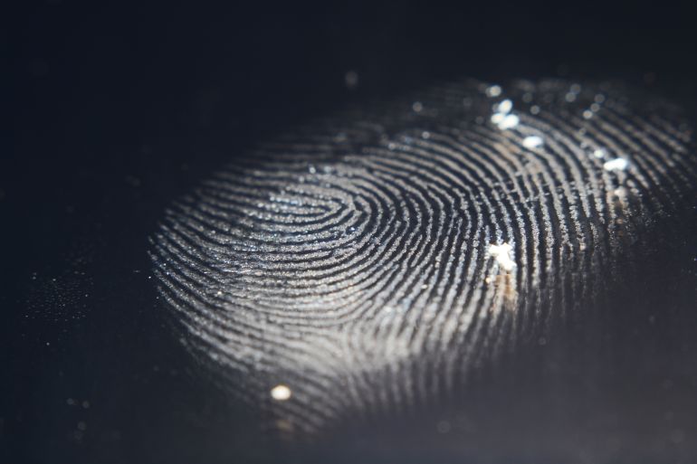 finger and hand print on black ground; Shutterstock ID 399219382; purchase_order: AJA; job: ; client: ; other: