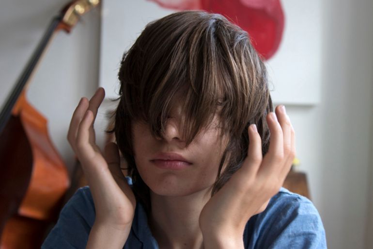 teenager portrait, hair hide eyes