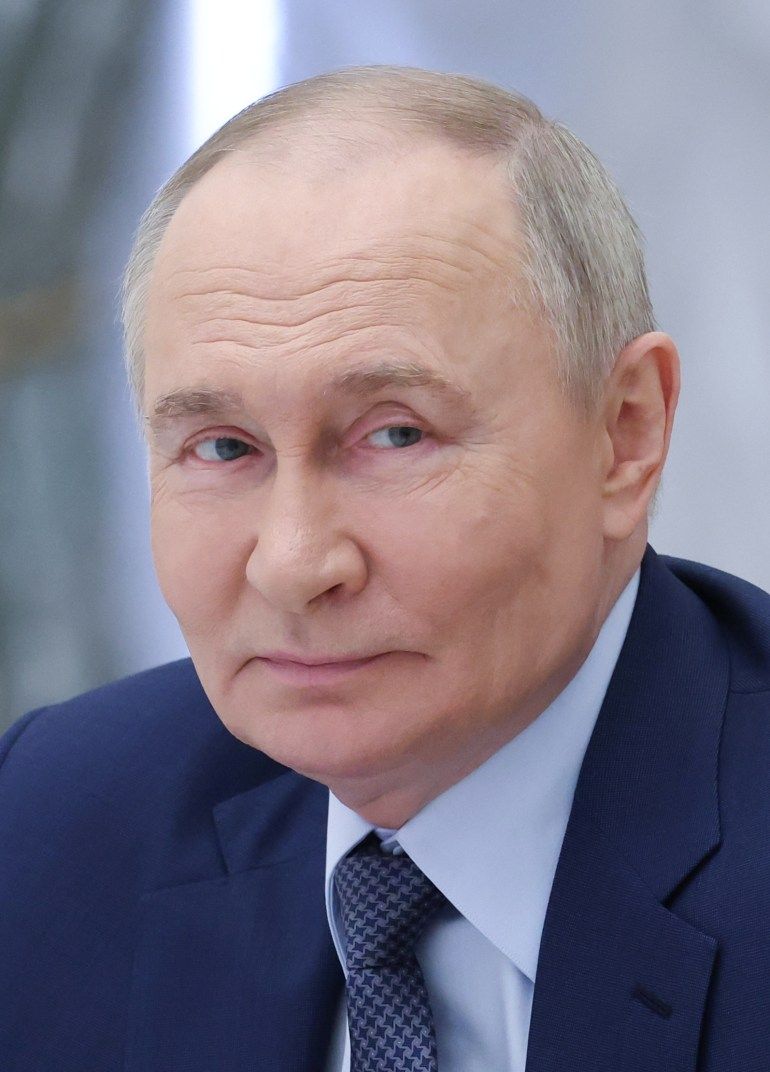 In this pool photograph distributed by the Russian state agency Sputnik, Russia's President Vladimir Putin chairs a meeting of the Russia - Land of Opportunities Supervisory Board in Moscow on May 27, 2025.