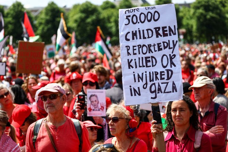 Demonstrators protest against conditions in Gaza and demand that the caretaker government impose sanctions against Israel, in The Hague, Netherlands, June 15 2025. REUTERS/Piroschka van de Wouw