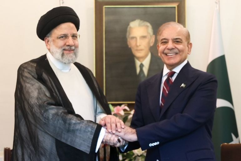 Iranian President Raisi in Pakistan- - ISLAMABAD, PAKISTAN - APRIL 22: (----EDITORIAL USE ONLY – MANDATORY CREDIT - 'IRANIAN PRESIDENCY / HANDOUT' - NO MARKETING NO ADVERTISING CAMPAIGNS - DISTRIBUTED AS A SERVICE TO CLIENTS----) Iranian President Ebrahim Raisi (L) and Pakistani Prime Minister Shehbaz Sharif (R) hold a meeting in Islamabad, Pakistan on April 22, 2024.