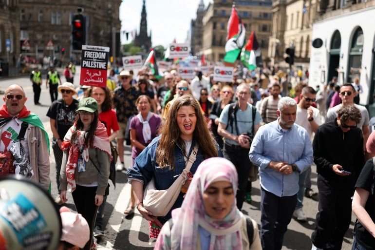 EDINBURGH, SCOTLAND - JUNE 28: Demonstrators hold a march and rally to the American Consulate during an Anti War protest on June 28, 2025 in Edinburgh, Scotland. (Photo by Jeff J Mitchell/Getty Images)
