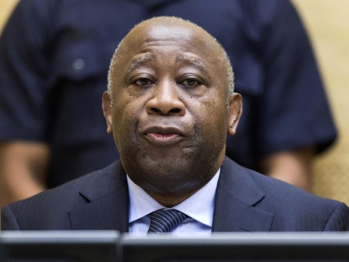 FILE - In this Feb. 19, 2013 file photo former Ivory Coast President Laurent Gbagbo attends a confirmation of charges hearing at the International Criminal Court (ICC) in The Hague, Netherlands. Judges at the ICC say on Thursday, June 12, 2014, there is sufficient evidence against former Ivory Coast President Laurent Gbagbo that he must stand trial. Gbagbo is charged with orchestrating violence carried out by his supporters after Ivory Coast's 2010 elections. He denies wrongdoing. A date for his trial has not yet been set. (AP Photo/Michael Kooren, Pool, File)