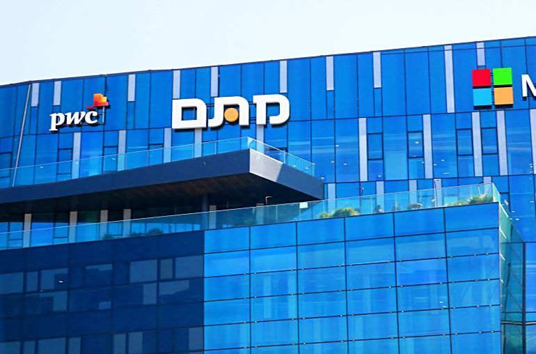 HAIFA, - SEPTEMBER 18, 2017: View of office building with famous logos (PWC) in Haifa MATAM high tech campus. The Park is an international technology center, with some of the world's leading hi-tech companies