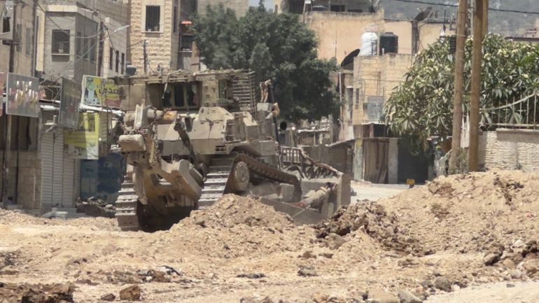 فاطمة محمود الجزيرة نت جنين فلسطين_ جرافات الاحتلال تهدم في محيط مخيم جنين