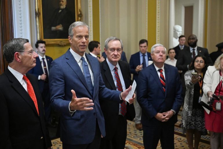 U.S. Senate Majority Leader John Thune (R-SD) speaks to the press next to U.S. Senator John Barrasso (R-WY) and Senator Mike Crapo (R-ID) after the Senate passes U.S. President Donald Trump’s sweeping spending and tax bill, on Capitol Hill in Washington, D.C., U.S., July 1, 2025. REUTERS/Annabelle Gordon