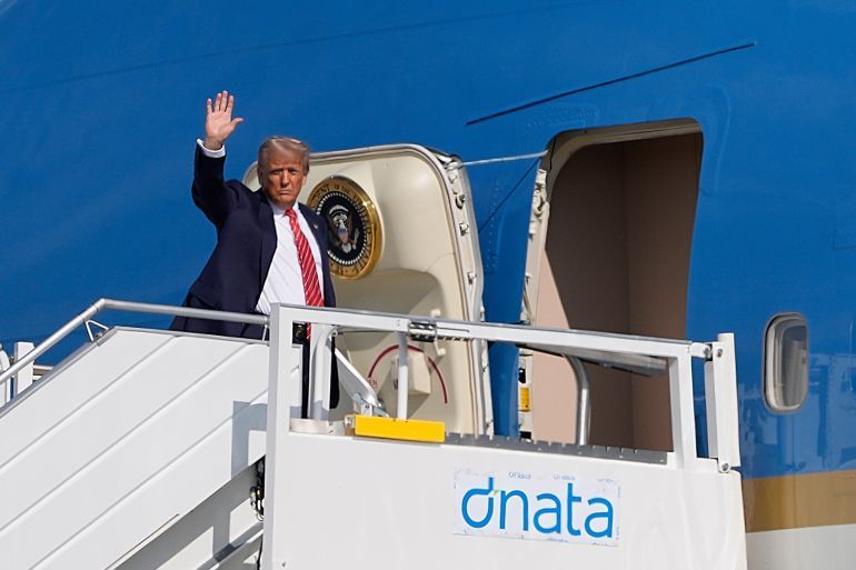President Donald Trump waves as he boards Air Force One to depart Amsterdam Schiphol Airport after the NATO summit, taking place in The Hague, Netherlands, Wednesday, June 25, 2025. (AP Photo/Alex Brandon)