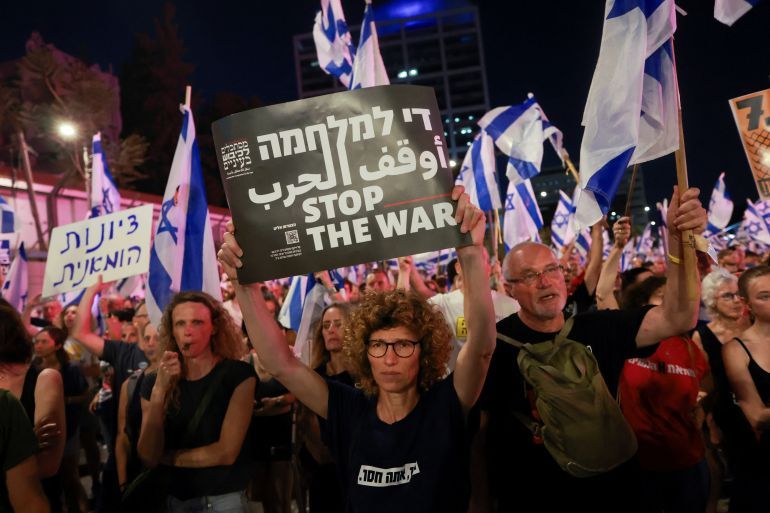 People attend a demonstration against Israeli Prime Minister Benjamin Netanyahu's government and a call for the release of hostages in Gaza, amid the Israel-Hamas conflict, in Tel Aviv, Israel, June 29, 2024. REUTERS/Eloisa Lopez