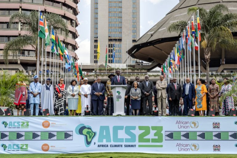 President of Kenya William Ruto (C) surrounded by other African leaders delivers his closing speech during the closure of the Africa Climate Summit 2023 at the Kenyatta International Convention Centre (KICC) in Nairobi on September 6, 2023. (Photo by Luis Tato / AFP)