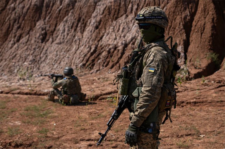 DONETSK OBLAST, UKRAINE - AUGUST 15: Colombian mercenaries, fighting for Ukraine, practice target shooting on the training ground on August 15, 2023 in Donetsk Oblast, Ukraine. Not only military volunteers from other countries are fighting for Ukraine, but also hundreds of Colombian mercenaries. Colombian fighters are increasingly drawn to Ukraine because the pay they receive there is much higher than what is normally paid in Colombia. Colombia is fertile ground for recruitment because it has the largest army in South America - after decades of fighting Marxist rebels and drug cartels. (Photo by Viktor Fridshon/Global Images Ukraine via Getty Images)
