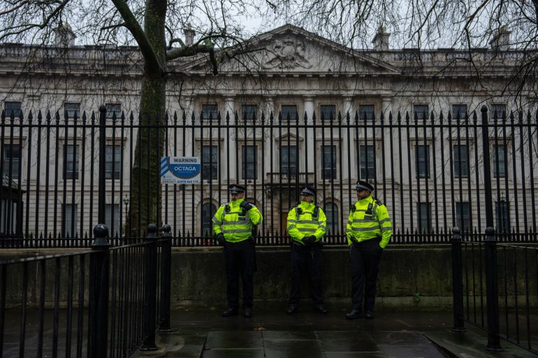 LONDON, ENGLAND - FEBRUARY 8: Police officers stand watch during a demonstration at the proposed site of China's embassy on February 8, 2025 in London, England. Protest groups from various diasporas, including Hong Kong, Tibet, Uyghur, Chinese dissidents, and other resident organisations, aim to demonstrate that the Royal Mint Court site is inappropriate for an embassy, as there is not enough space for safe demonstrations. (Photo by Carl Court/Getty Images)
