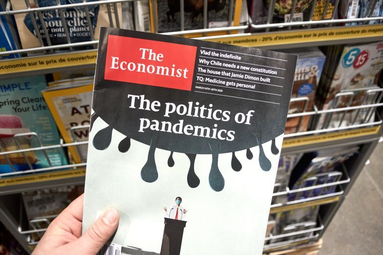 Montreal, Canada - March 23, 2020: The Economist magazine with The Politics of Pandemics title. The Economist is an English-language weekly magazine-format newspaper owned by the Economist Group.