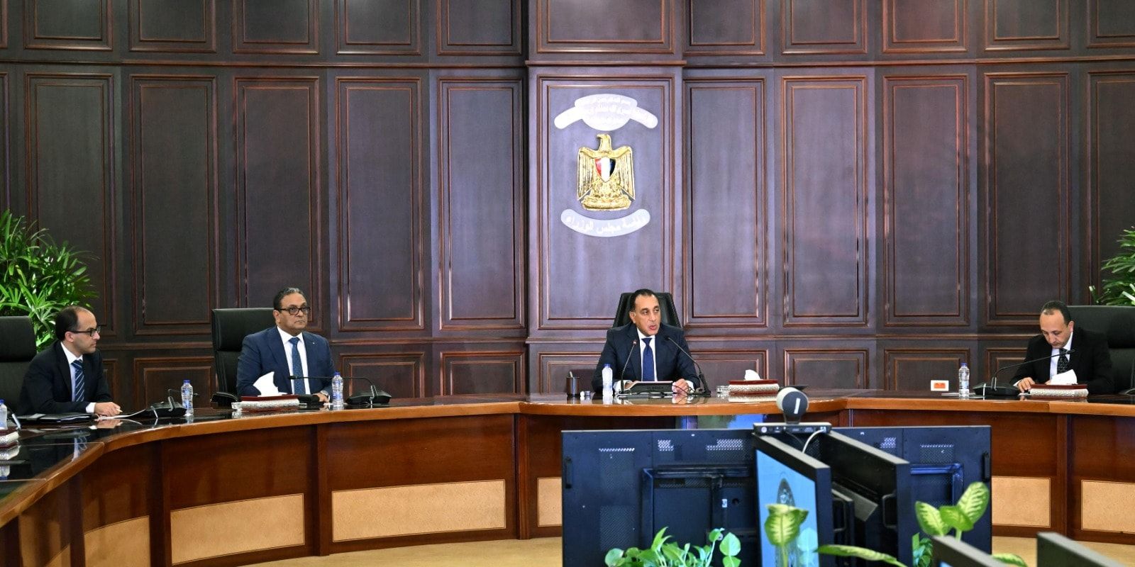 May be an image of 4 people, the Oval Office and text