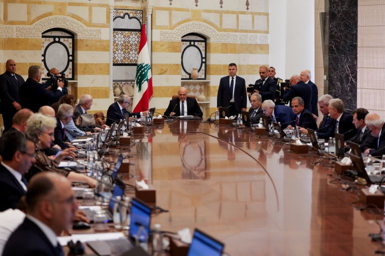 Lebanese President Joseph Aoun, Lebanese Prime Minister Nawaf Salam and members of the Lebanese cabinet meet to discuss efforts to bring all weapons in the country under the control of the state, at the Presidential Palace in Baabda, Lebanon August 5, 2025. REUTERS/Emilie Madi