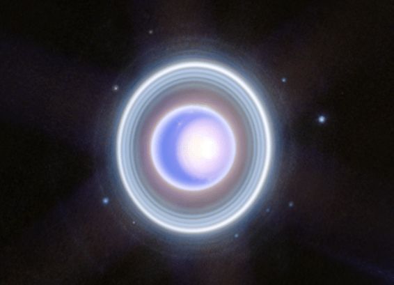 This image of Uranus from the James Webb Telescope's Near-Infrared Camera (NIRCam) shows Uranus’s seasonal north polar cap and dim inner and outer rings. This Webb image also shows 9 of the planet’s 27 moons.NASA, ESA, CSA, STScI