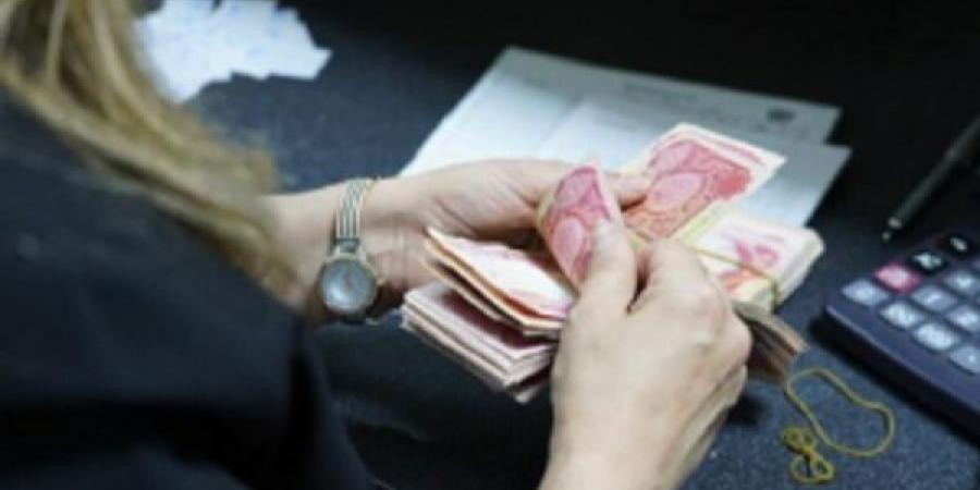 العراق يحظر الدفع النقدي في المؤسسات الحكومية الشهر المقبل - هرم مصر